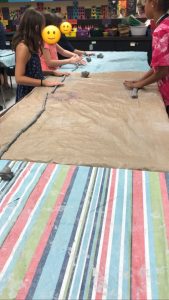 students working with clay