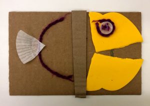fish on cardboard made from felt, yarn, coffee filters