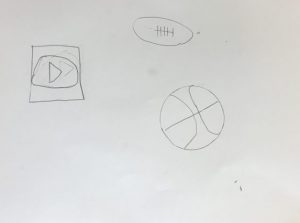 basketball, play button, football drawn in pencil on white paper