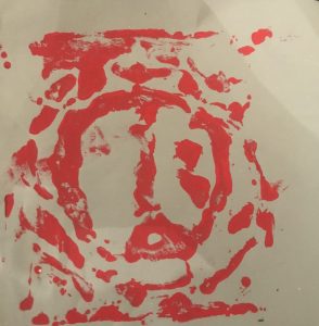 red peace symbol on white paper