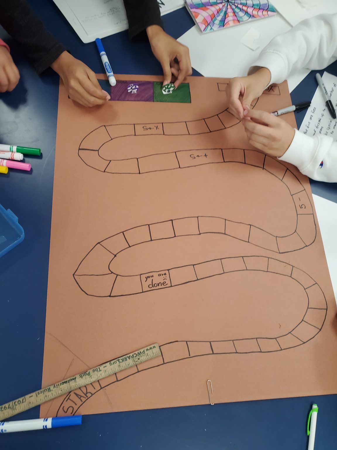 students drawing board game