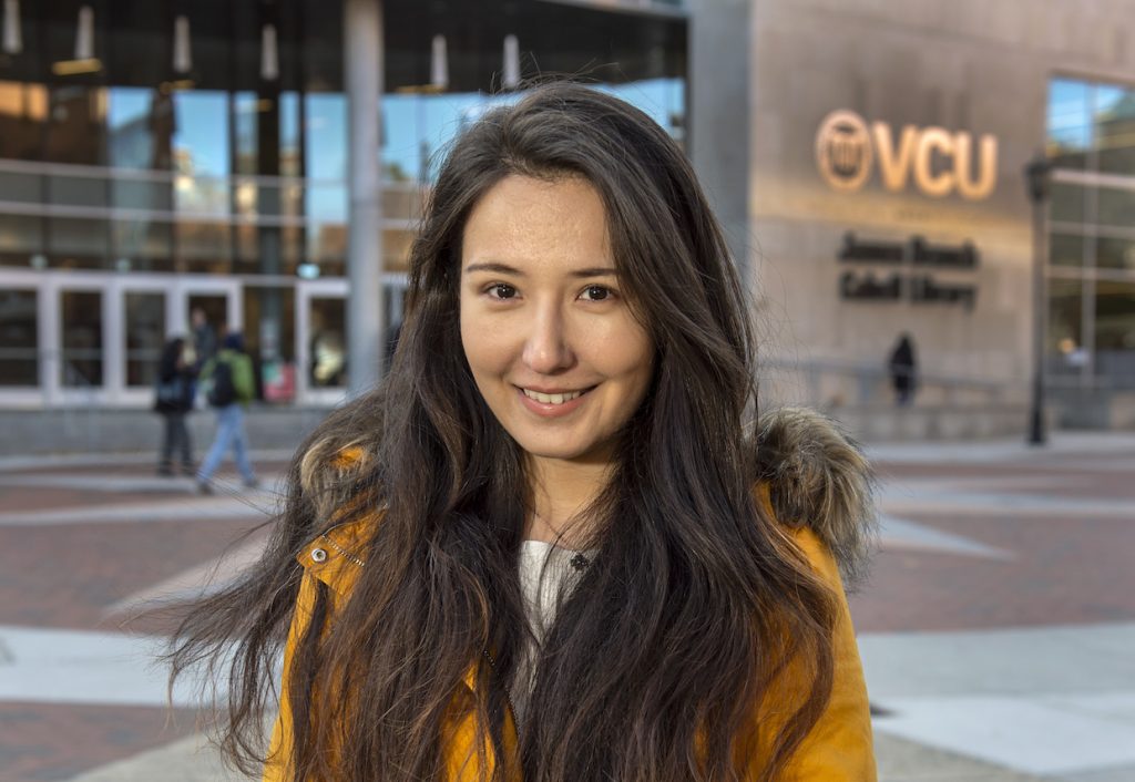  Zulhumar Adil, who emigrated from Urumqi, China, is eyeing a health care career after graduating from VCU this month. (Kevin Morley, University Marketing) 