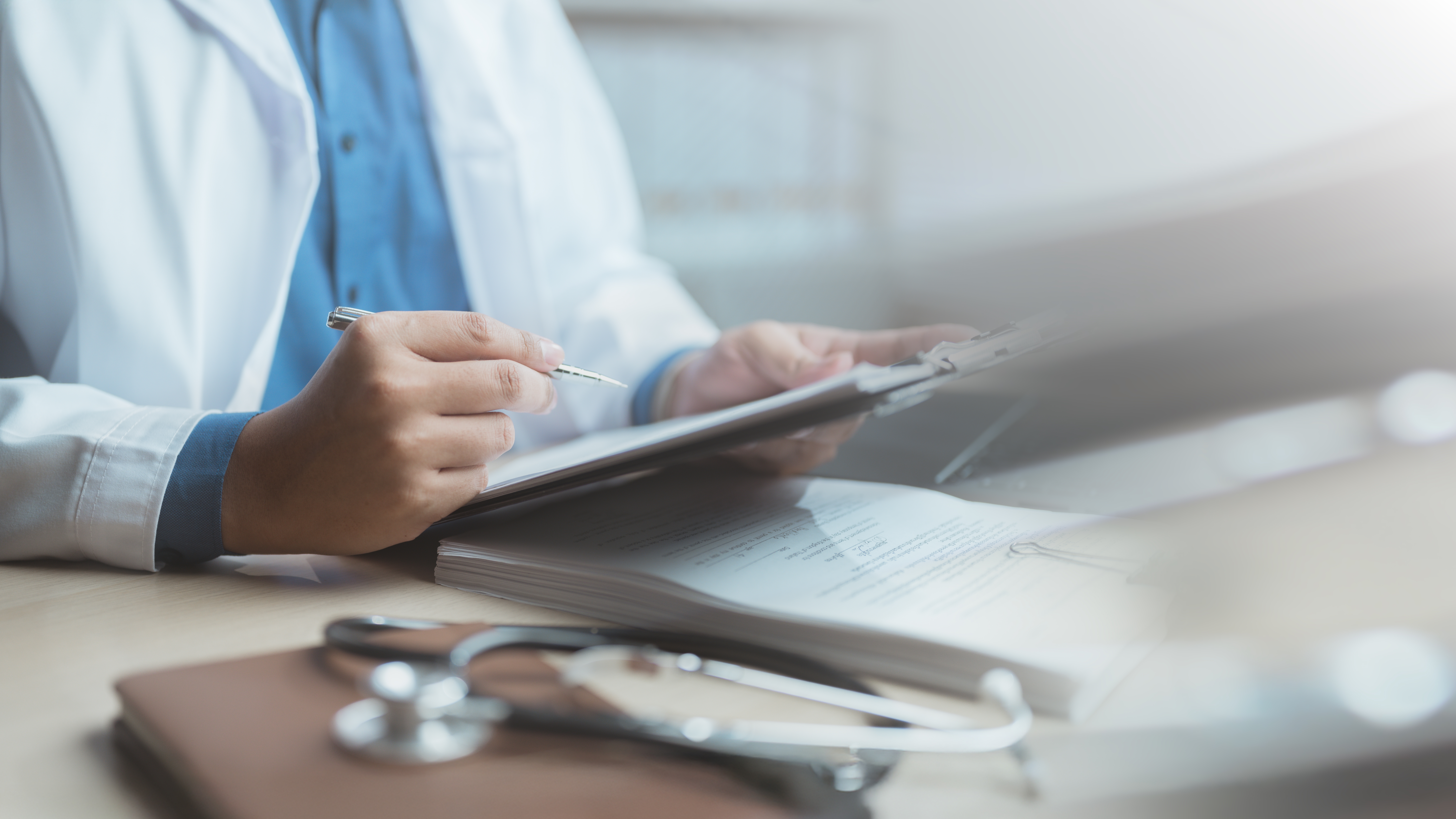 Clinician holding clipboard