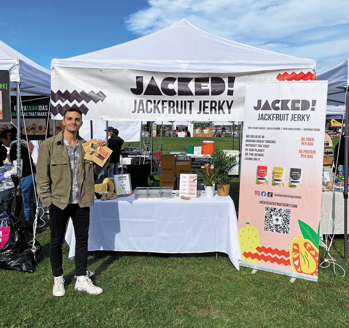 Student from da Vinci Center's Master of Product Innovation program selling their Jackfruit Jerky at an event.