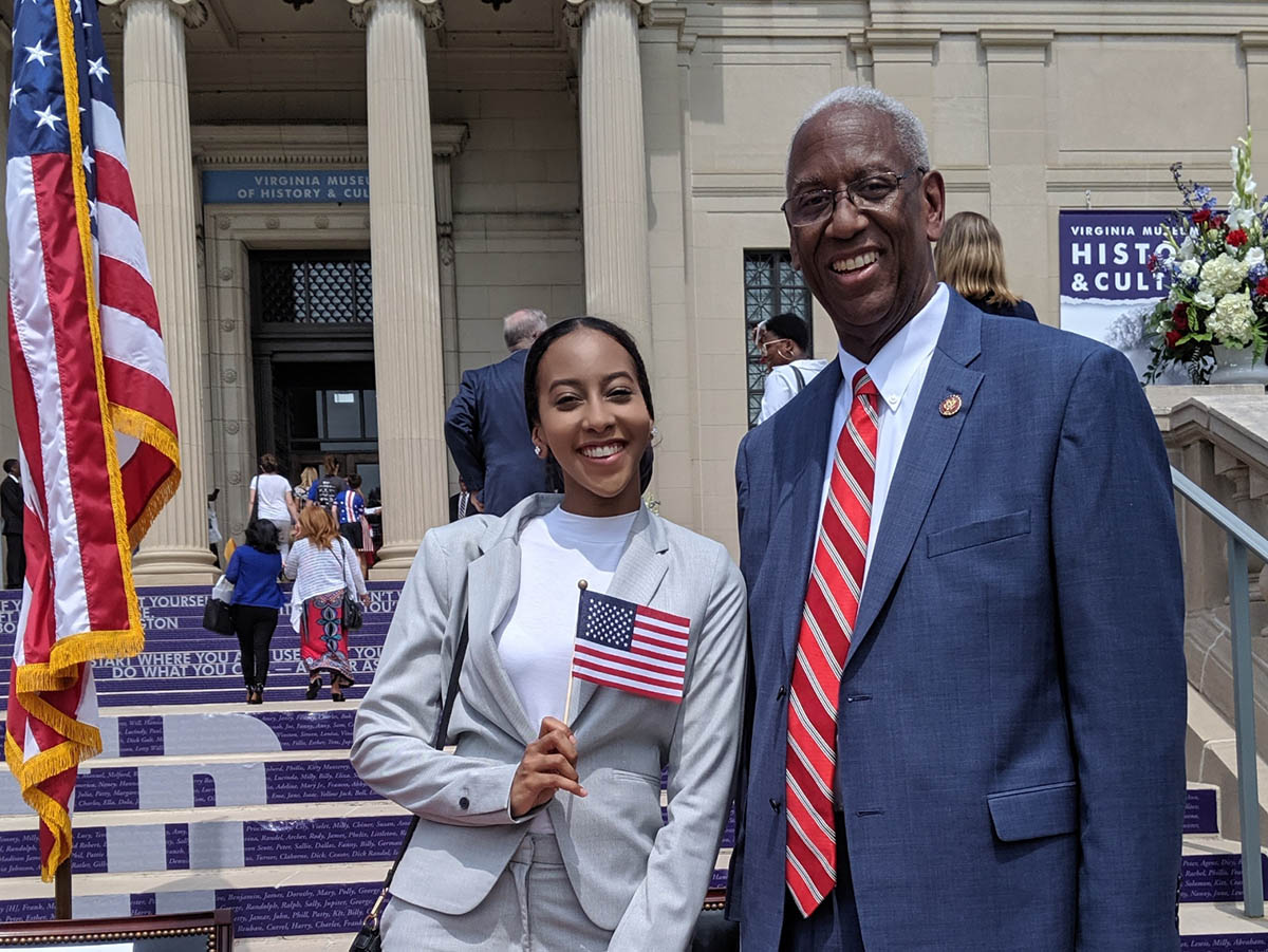 Ibrahim poses next to Congressman Donald McEachin during a naturalization ceremony at the Virginia Museum of History & Culture on July 4, 2019.