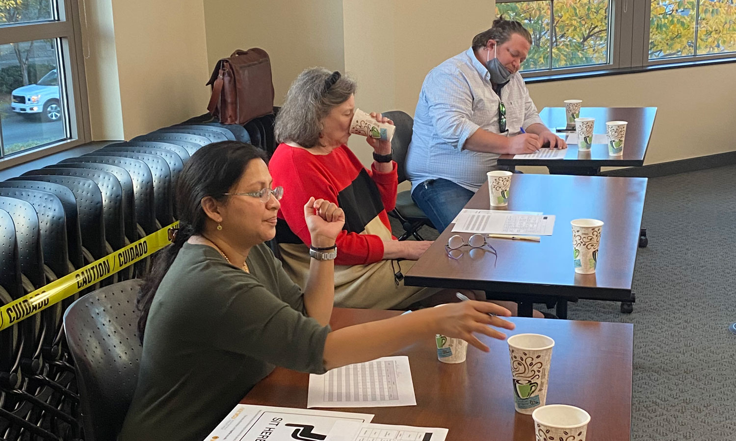 From left: Radhika Barua, Ph.D., Barbara D. Boyan, Ph.D., and Stephen Robertson of Blanchard’s Coffee Roasting Co., judged students’ coffee samples.