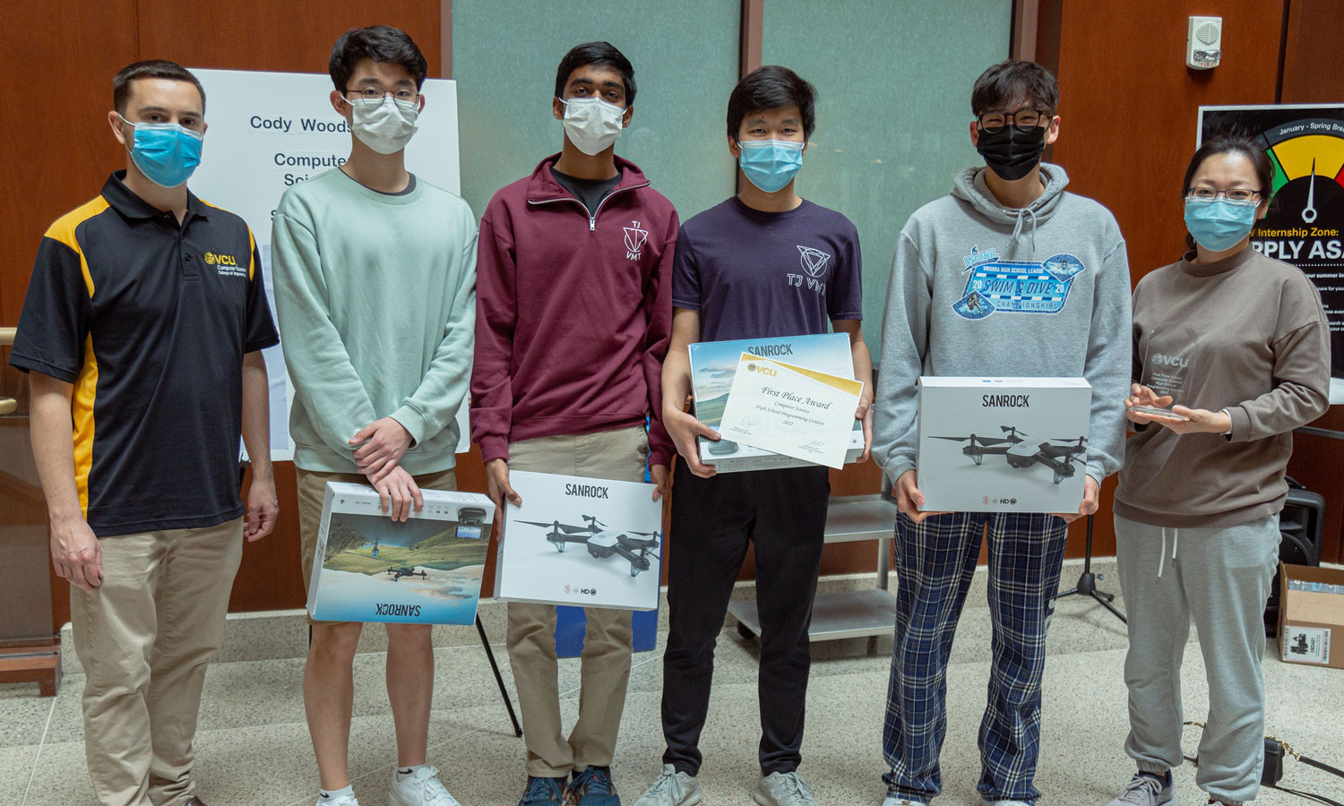 First-place winners: Albert Kang, Sam Wang, Alvan Arulandu, Kevin Shan from Thomas Jefferson High School for Science and Technology, are pictured with (far left) Alberto Cano, Ph.D., VCU Computer Science and (far right) Nicole Kim, advisor.