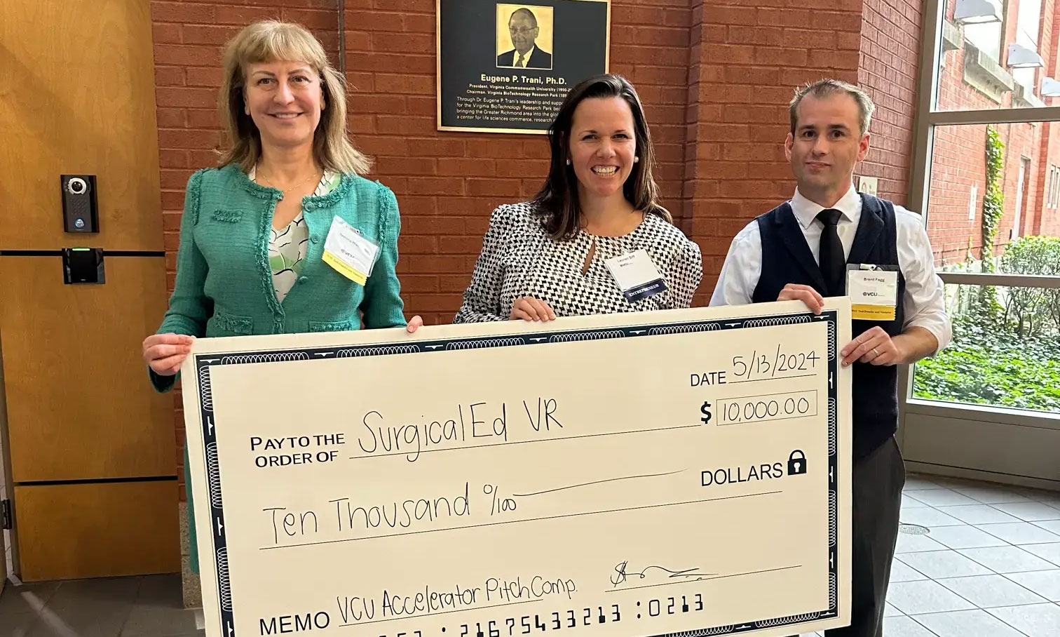 Ivelina Metcheva, Ph.D., assistant vice president for innovation at VCU TechTransfer and Ventures; Lauren Siff, M.D., representing the winning team SurgicalED VR; and Brent Fagg, assistant director for innovation at VCU TechTransfer and Ventures, at the VCU Startup Accelerator’s first Pitch Day competition.