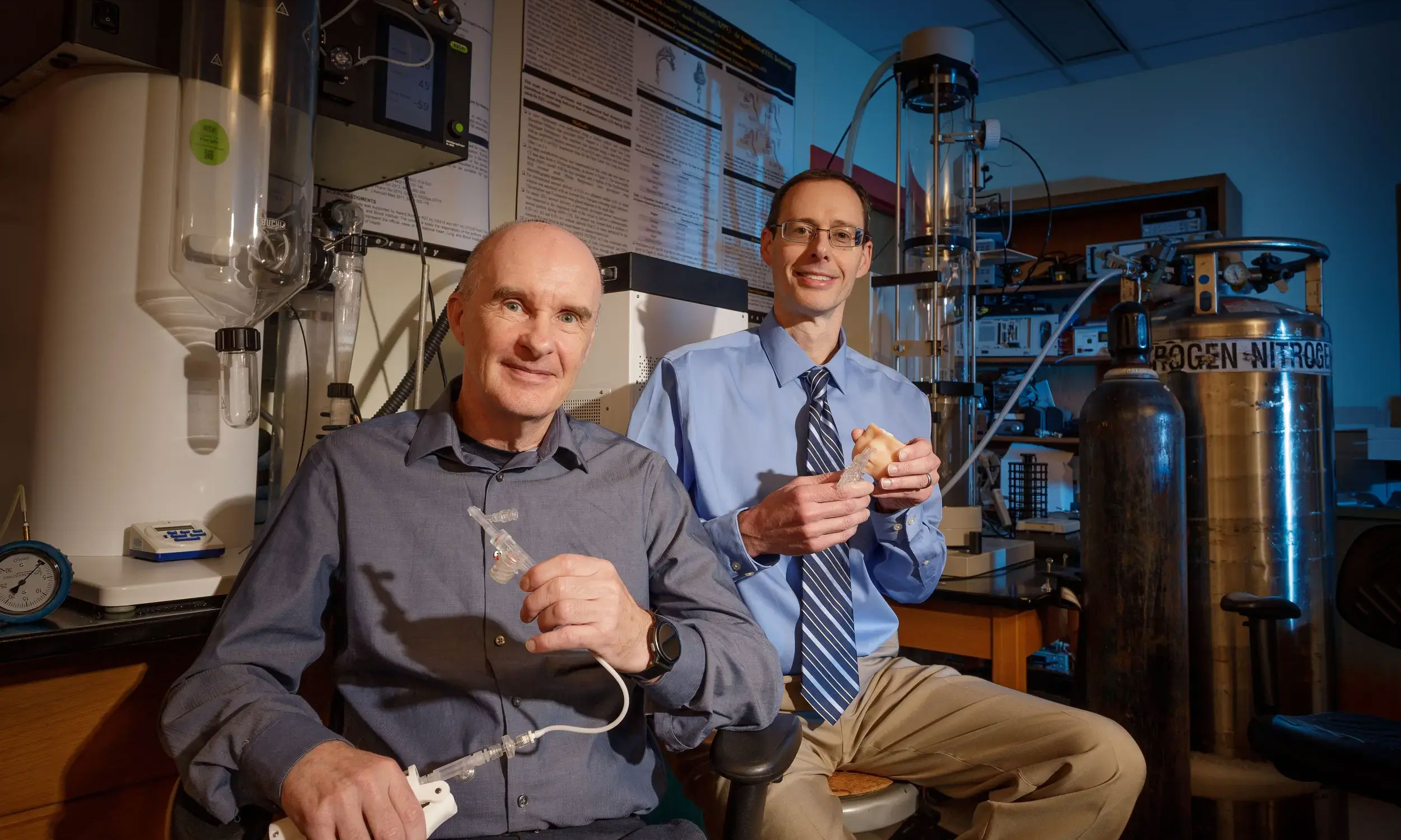 Michael Hindle, Ph.D., (left) and Worth Longest, Ph.D., in the aerosol research lab on VCU’s MCV Campus.