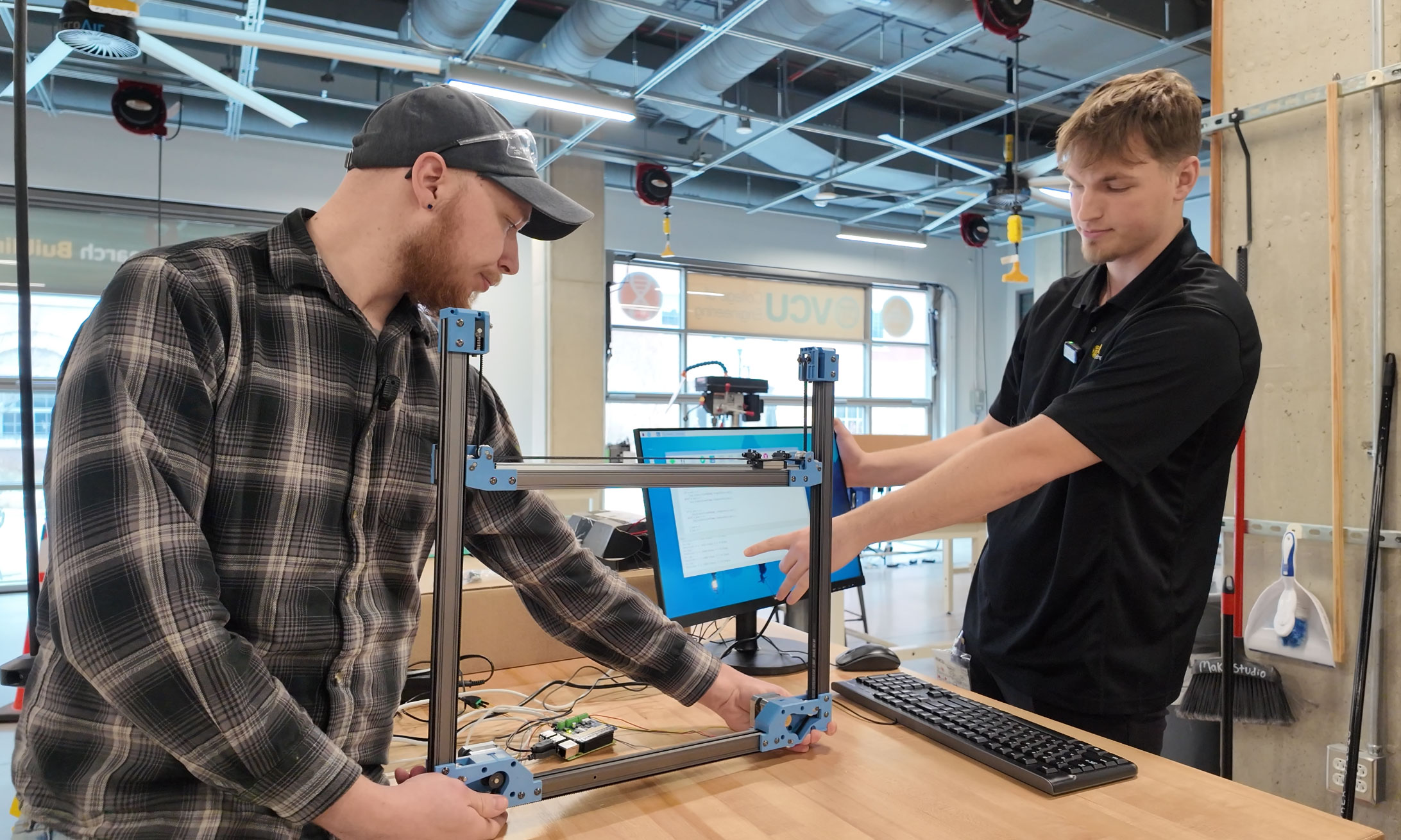 Two students working on their Capstone Design project