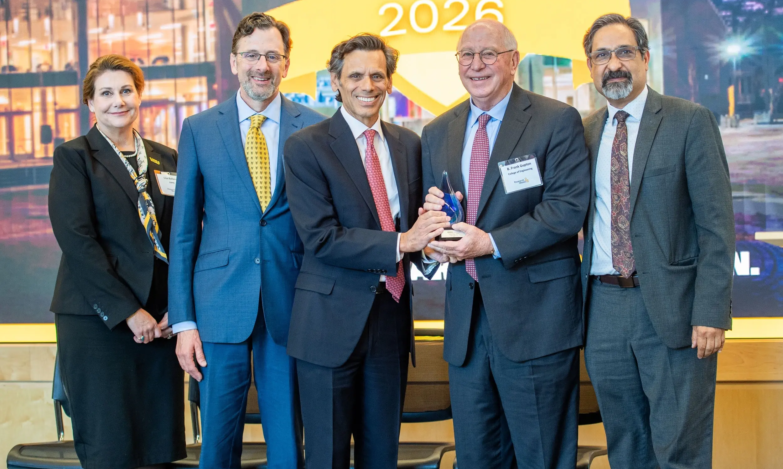 Frank Gupton (second from right), winner of the Eminent Researcher of the Year award, with (from left) Lisa Ballance, associate vice president for research; John Ryan, associate vice president; VCU President Michael Rao; and P. Srirama Rao, vice president for research and innovation.