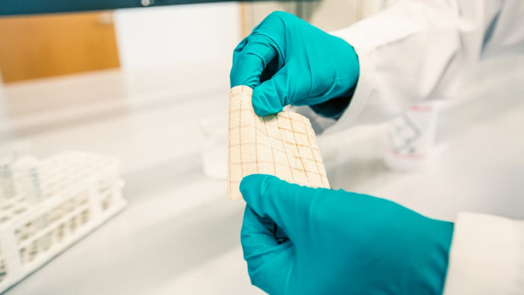 Maintaining flexibility after applying the boron nitride coating is important to creating a functional space suit that affords protection to astronauts.