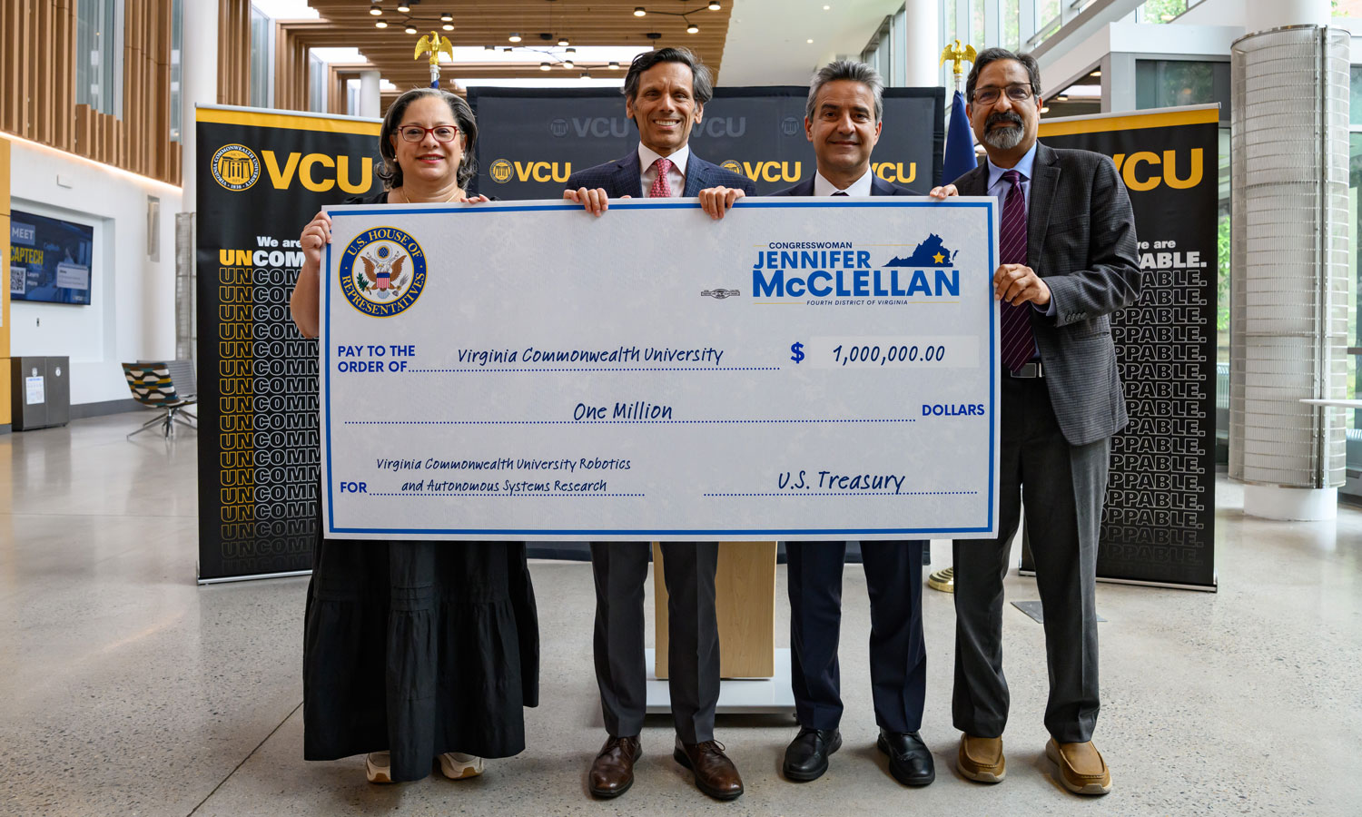 From left to right: Congresswoman Jennifer McClellan; VCU President Michael Rao, Ph.D.; Azim Eskandarian, D.Sc., the Alice T. and William H. Goodwin Jr. Dean of the VCU College of Engineering; Srirama Rao, Ph.D., Vice President for Research and Innovation at VCU.