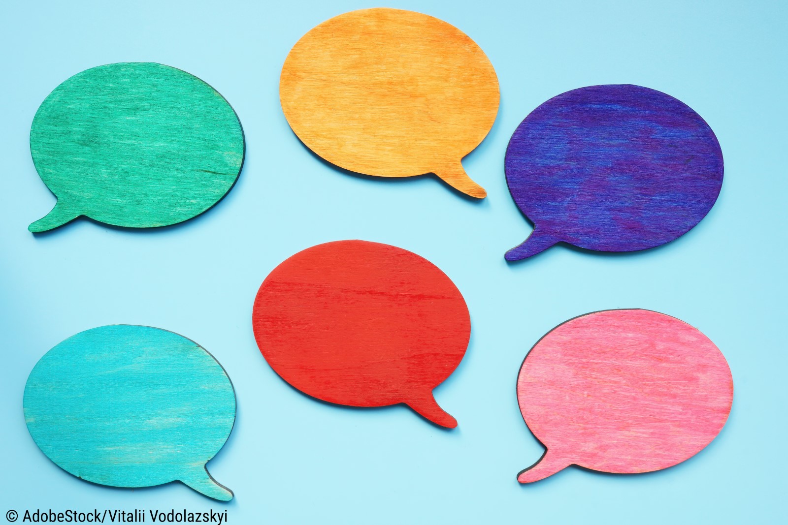 In this image we see 6 brightly colored speech bubbles against a blue background.