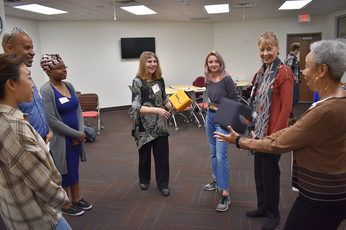 Jacquelyn Pogue (second from right) attends a RAMmalogues session in Fall 2019 at VCU Cabell Library.