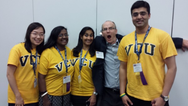 Team VCU -- Yaena Min (left), Della Varghese, Batul Electricwala and Kunal Saxena -- celebrate with professor David Holdford after cracking into the final four of research competition.