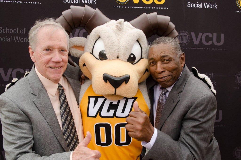 Bob Schneider and Bob Peay gives the thumbs up as they pose with V-C-U mascot Rodney the Ram during the Macro Brew fundraising event in 2017.