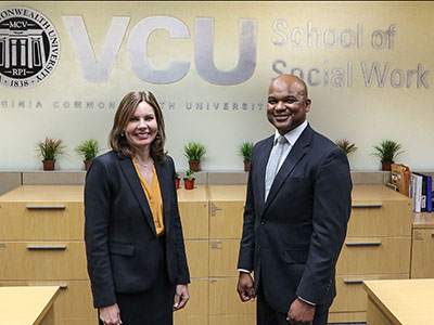Rebecca Gomez and Paul Harris in the VCU School of Social Work office