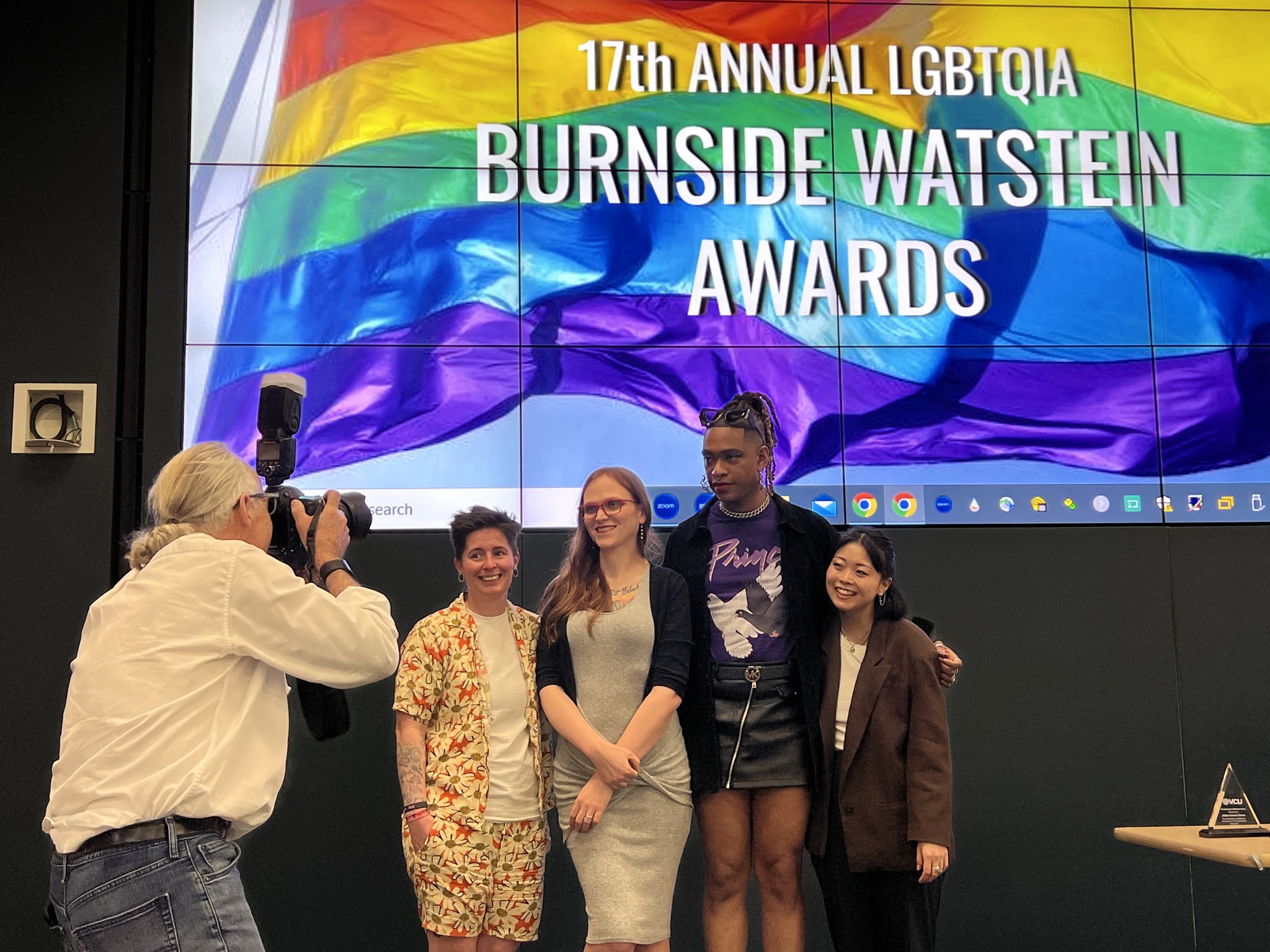 A photographer takes pictures of the four winners of the 18th annual Burnside Watstein LGBTQIA Awards at VCU. Recipients are Van Vox (staff), Melissa-Irene Jackson (community/alum), Dr. Julian Kevon Glover (faculty) and Beck Oh (student). 