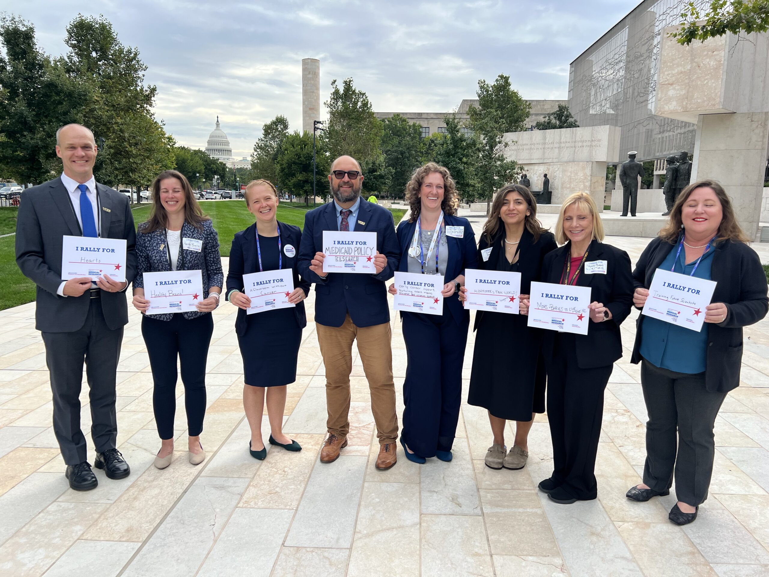 VCU Faculty hold up signs in support of medical research funding on Capitol Hill