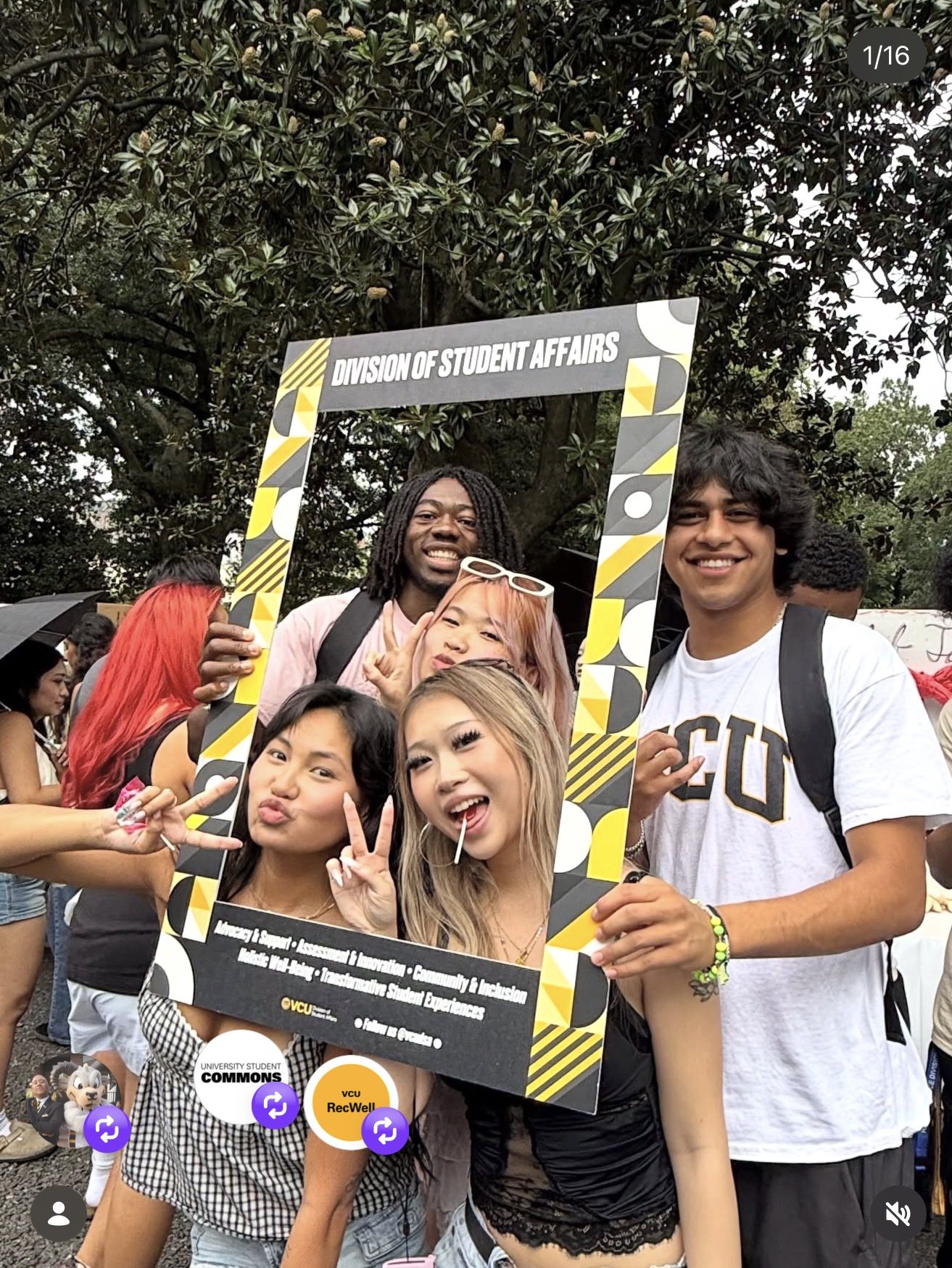 group of students posing for a photo in front of the Division of Student Affairs photo frame