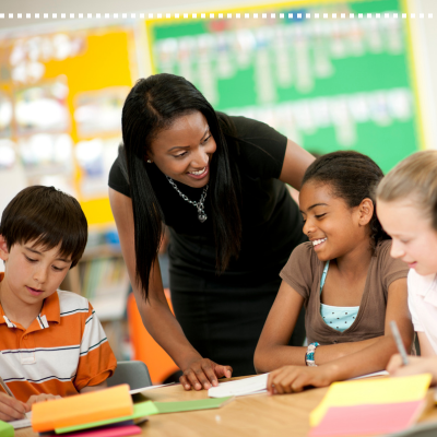 Image of teacher with middle school students.