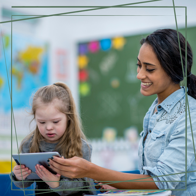 Teacher working with student