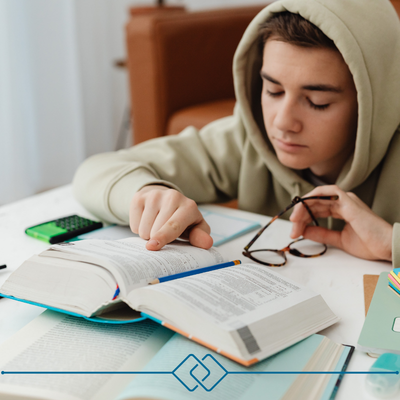 Photo of a student reading a book